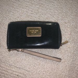 Micheal Kors patent leather logo wristlet Wallet